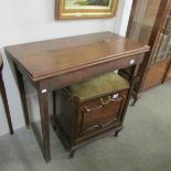 An oak fold over table.