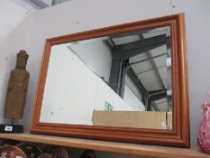 A large mahogany framed bevel edged mirror