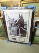 A signed framed and glazed photograph of Bob Champion and Aldaniti.