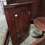 A Victorian mahogany corner cupboard.