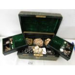 A good mixed lot of costume jewellery in an a/f vintage jewellery box.