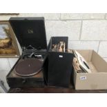A HMV portable gramophone player and quantity of 78 rpm records