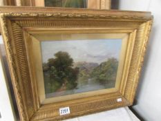 A gilt framed oil on canvas landscape signed Edward Price, image 29 x 20 cm.