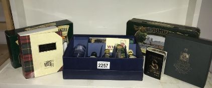A collection of boxed spirit miniatures etc.