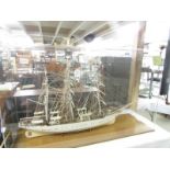 A superb hand built model of "The Denmark" in a plastic display case measuring 68 x 113 x 35 cm.