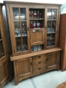 A Continental oak dresser/cabinet
