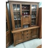 A Continental oak dresser/cabinet