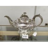 An ornate 19th century silver teapot, London Hall mark, 1834/35, makers mark I.L, S.L, C.L.