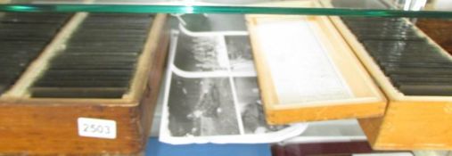 Glass negatives - A collection of approximately 144 glass negatives in 2 boxes containing images