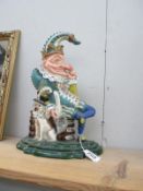 A painted cast iron Mr Punch door stop