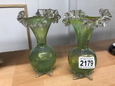 A pair of Victorian green glass vases in excellent order
