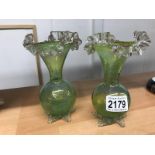 A pair of Victorian green glass vases in excellent order