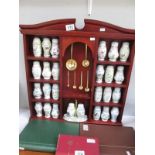 A Lenox porcelain spice rack collection including 24 spice jars, salt and pepper and spoons,