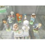 A collection of 10 Beswick Beatrix Potter figurines including Tom Kitten, Tommy Brock,