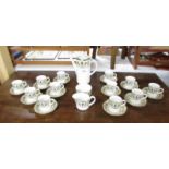 A Royal Worcester coffee set comprising 12 coffee cans, 12 saucers, coffee pot,