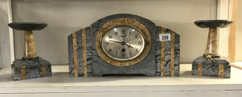 A 1930's French marble clock set