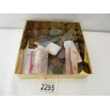 A mixed lot of coins and bank notes.