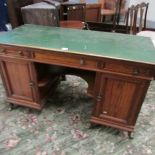 An old satin wood 2 door 3 drawer double pedestal desk.