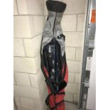 A set of Head RF 10 skis & poles in ski bag