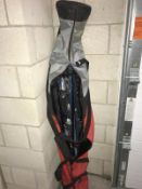 A set of Head RF 10 skis & poles in ski bag