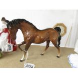 A Royal Doulton Horse.