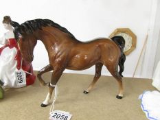 A Royal Doulton Horse.