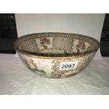 A Chinese bowl featuring horse riders pictured to centre