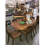 A set of 6 mahogany dining chairs with scroll arm carvers