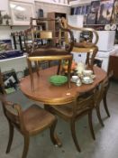 A set of 6 mahogany dining chairs with scroll arm carvers