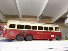 A large early Tri-ang? wooden sit/ride on London Transport,