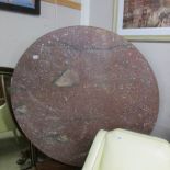 A Victorian painted mahogany tip top table.