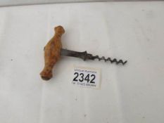 A 19th century corkscrew inscribed to handle 'C.V.