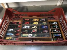 3 wall display case with 45 unboxed Lledo models,