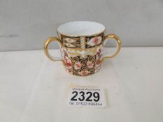 A Royal Crown Derby Old Imari pattern 3 handled mug.