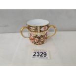 A Royal Crown Derby Old Imari pattern 3 handled mug.