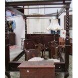 A Victorian style mahogany 4 poster bed frame.
