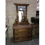 An oak mirror back dressing table