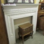 A Victorian Coalbrookdale cast iron fire surround with makers mark to rear.