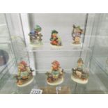 6 Goebel Hummel figurines.