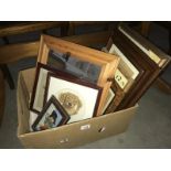 A box of picture frames etc.