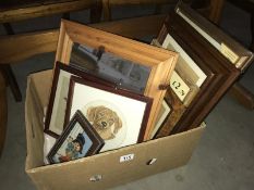 A box of picture frames etc.