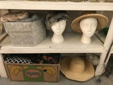 2 shelves of ladies hats and scarves etc.