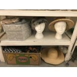 2 shelves of ladies hats and scarves etc.