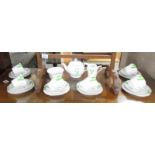 A 21 piece art deco tea set (1 tea cup a/f).