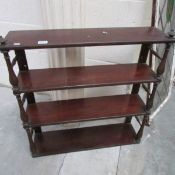 A set of mahogany book shelves.