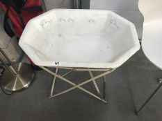 A vintage enamel baby bath on folding iron stand ****Condition report**** Stand has