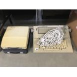 An Olivetti electric typewriter & 2 others