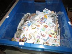 A crate of loose postage stamps.