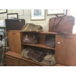 A quantity of vintage leather and canvas holdalls, briefcase, suitcase etc.