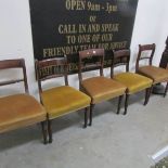 A set of 8 rope back chair.